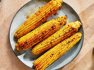 A platter of cajun-style corn on the cob