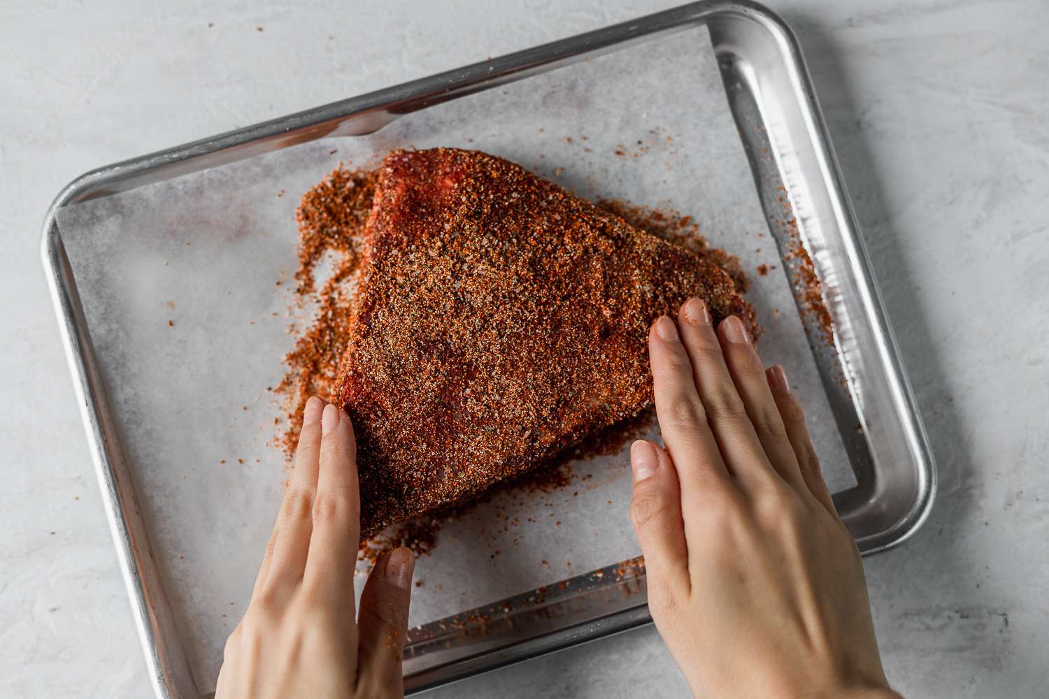 brisket covered with dry rub 