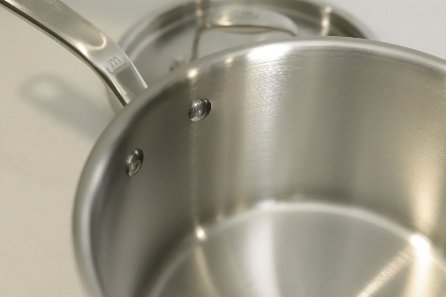 Close up of the handle rivets on the Made In small saucepan