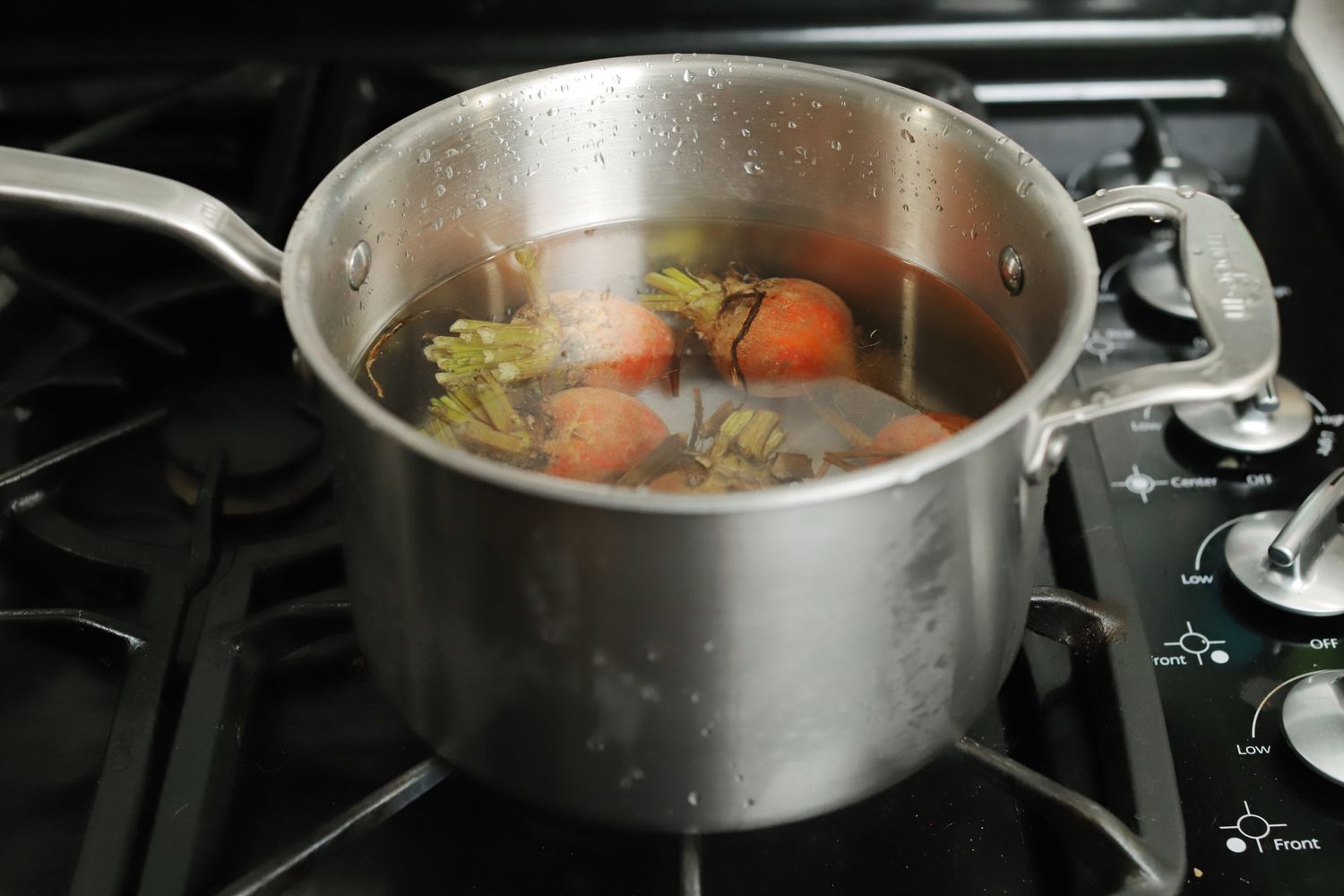 Boiling golden beets in the Made In small saucepan