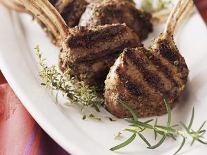 A plate of grilled lamb chops