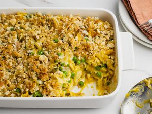 Easy tuna noodle casserole in a white dish with a serving spoon