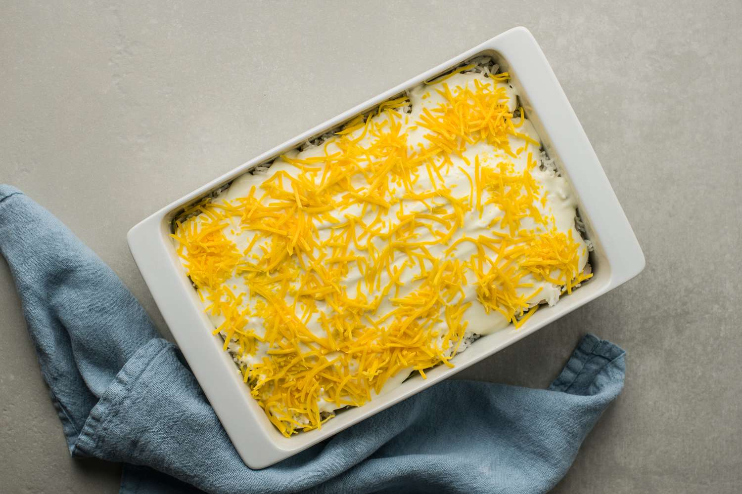 Chicken divan with sprinkled cheese on top