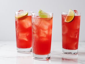 Madras cocktail recipe in three glasses with lime slices