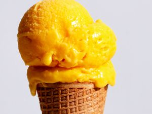 Mango ice cream on a cone