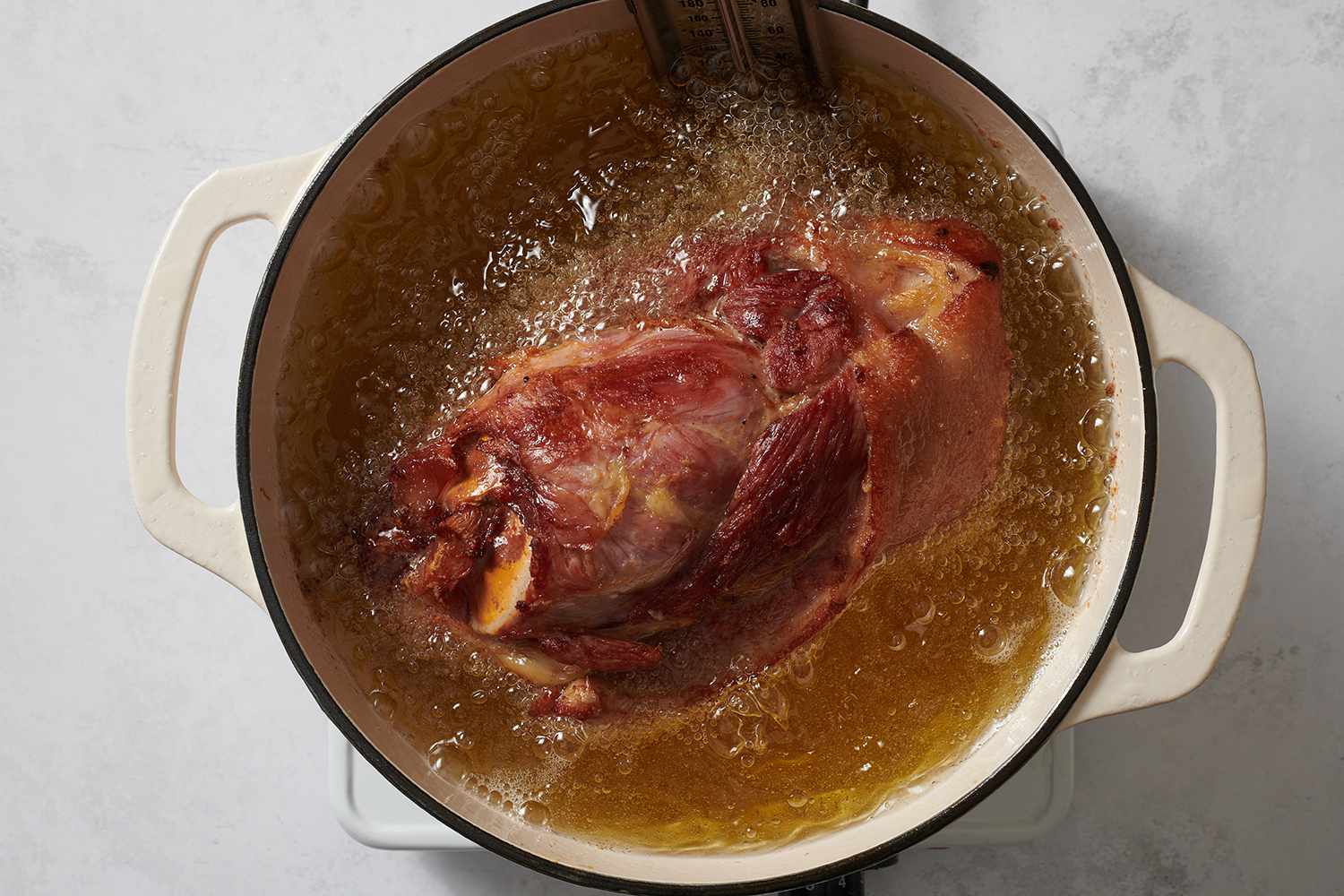 Ham hock frying in oil