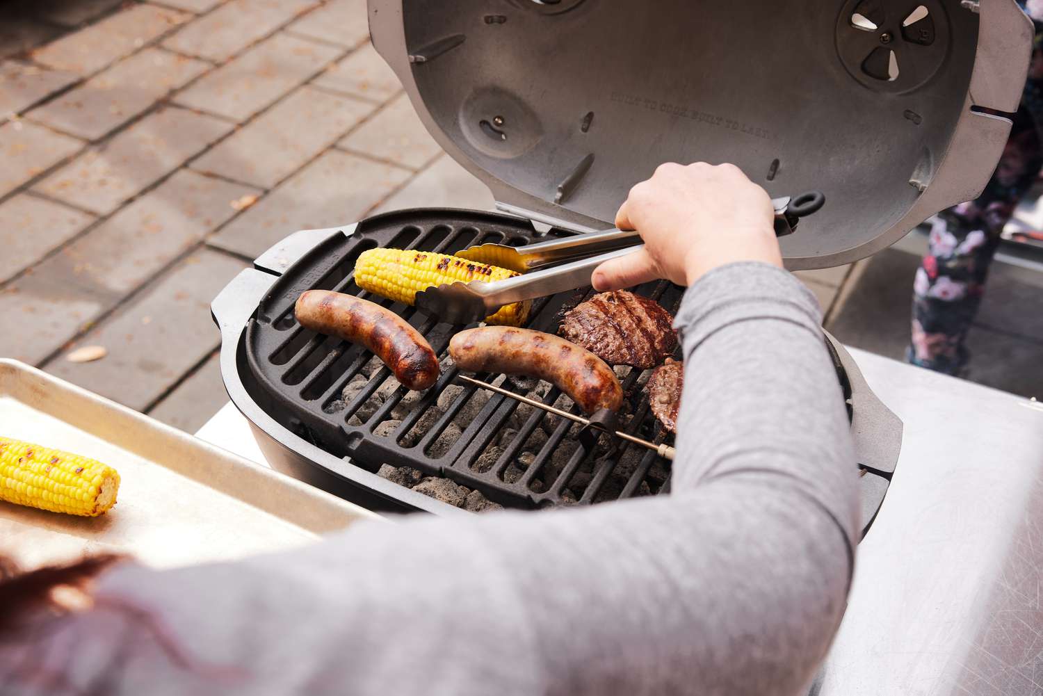 Testing bratwursts, corn, and burgers on the PKGO grill