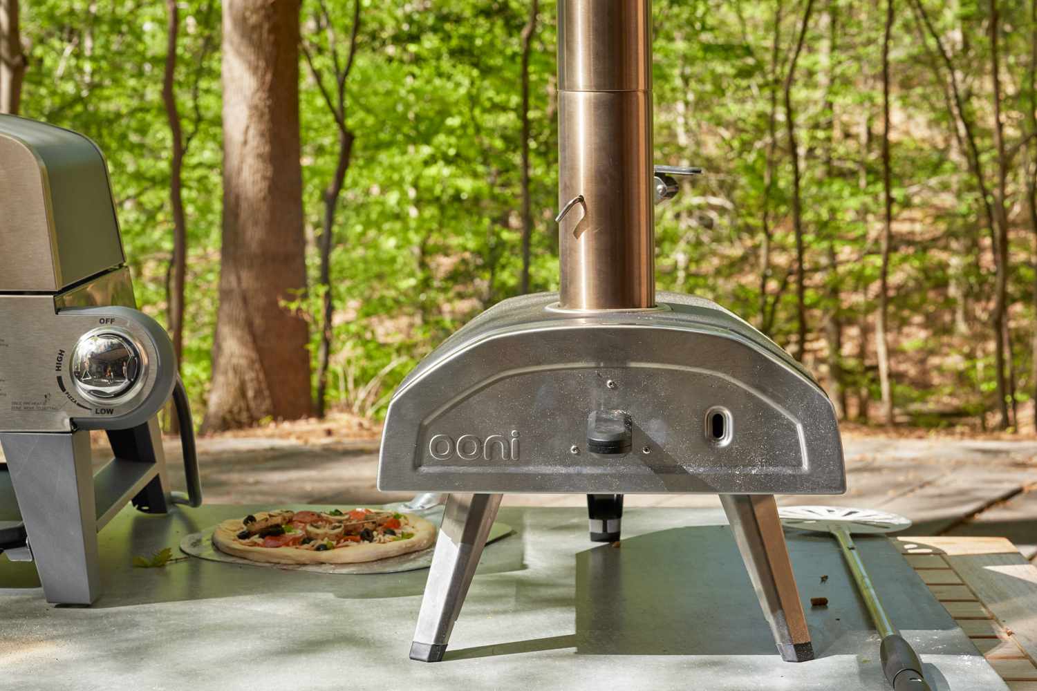 Ooni Fyra 12 Portable Wood-Fired Outdoor Pizza Oven with its door on