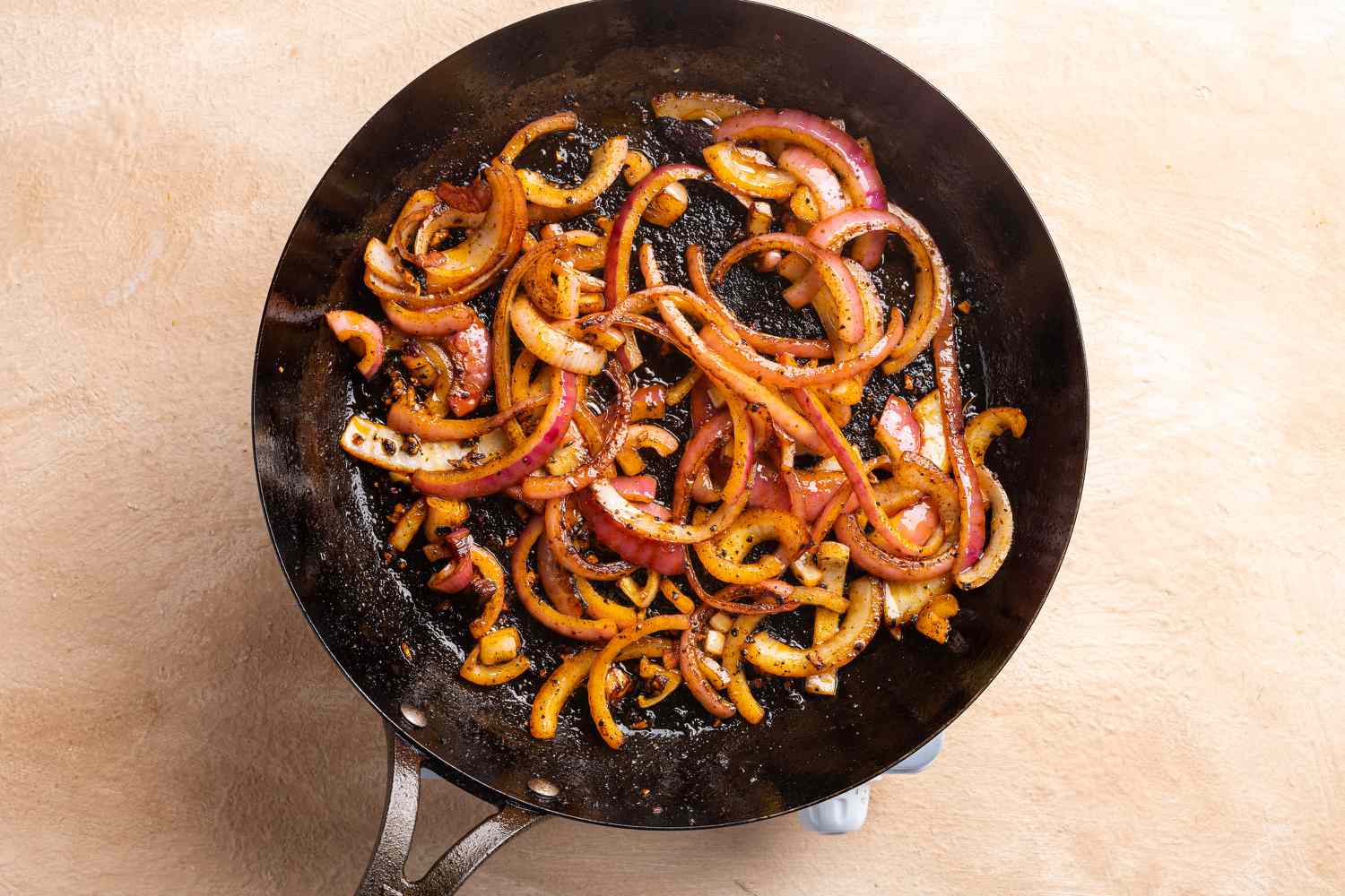 onions cooking in a pan 