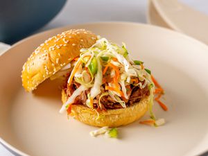 Vinegar-based Carolina slaw on a roll