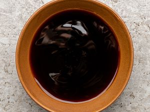 Hoisin sauce in a brown bowl
