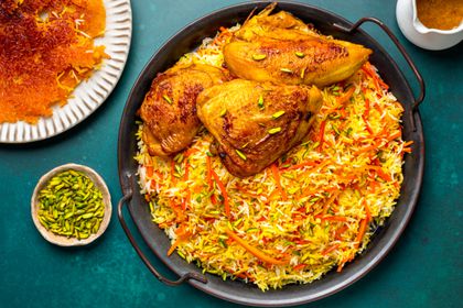 Braised saffron chicken with carrot and rice pilaf