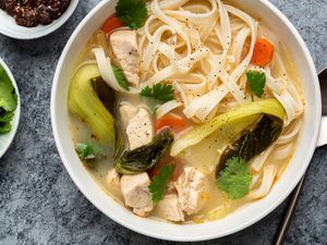 Gluten-Free Thai Chicken Noodle Soup in a bowl 