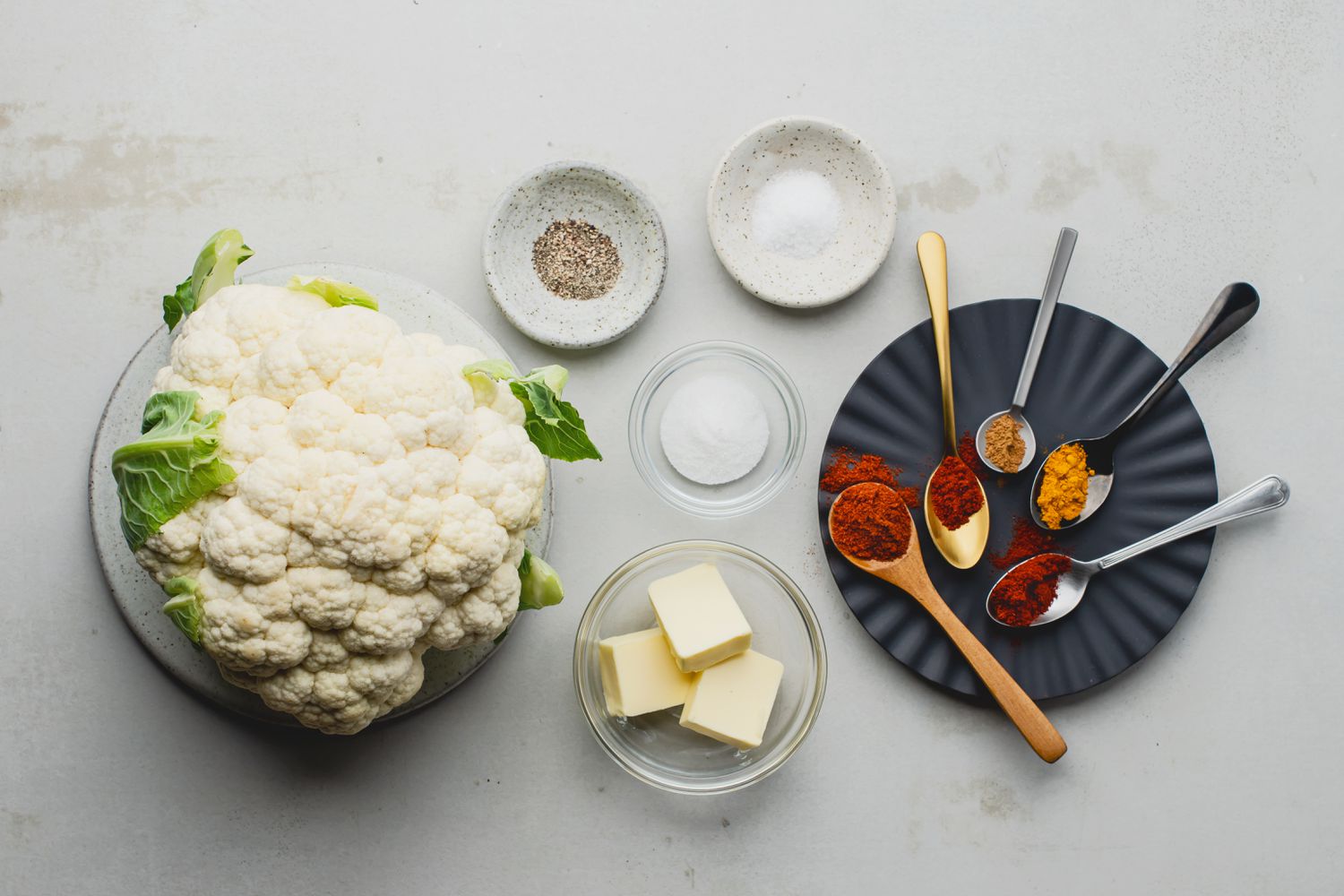 Ingredients for spicy roasted cauliflower recipe gathered