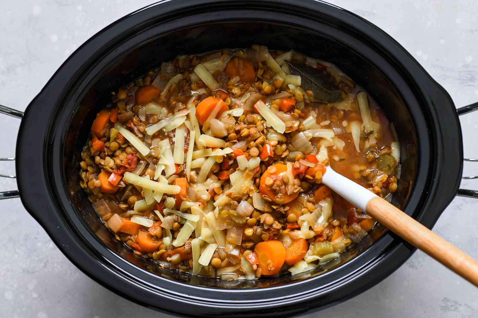 Stir the cheese into the slow cooker until it is melted