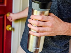 Person holding Contigo Autoseal West Loop Stainless Steel Travel Mug