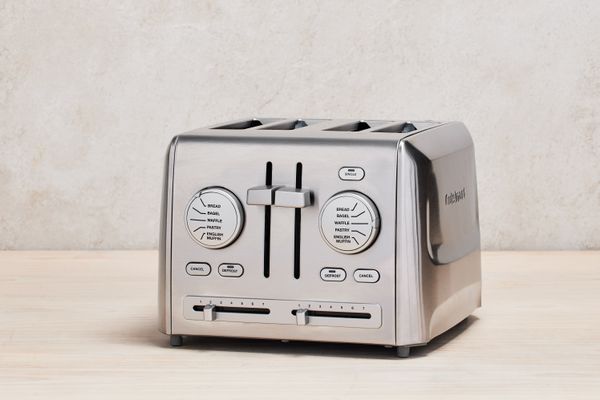 Cuisinart CPT-640 4-Slice Custom Select Toaster displayed on a wood counter