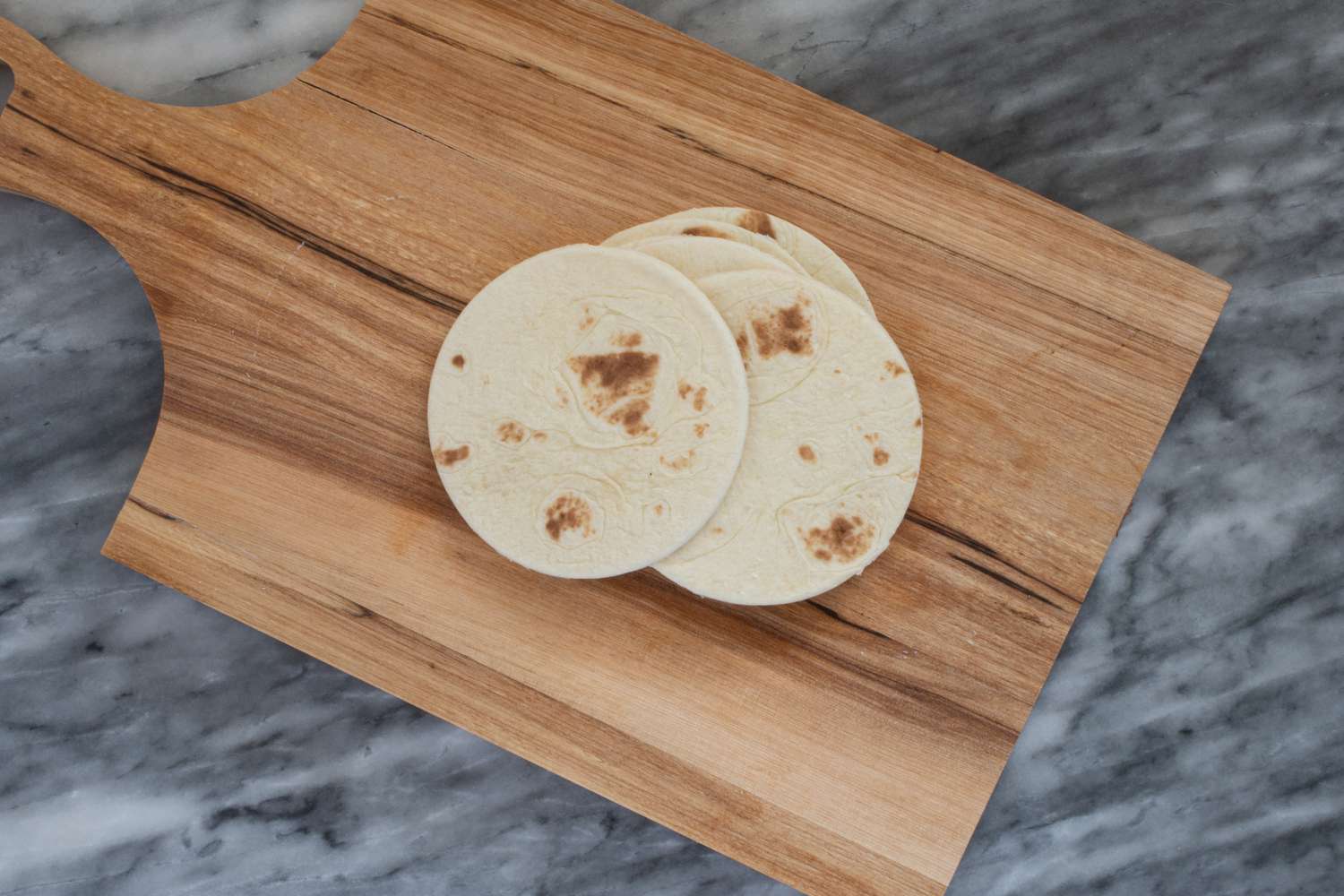 Make the tortillas bun-size.