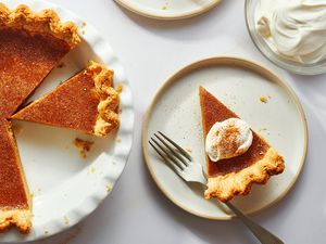 butternut squash pie slice served with whipped cream