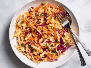 Quick and easy spicy Korean coleslaw on a white plate