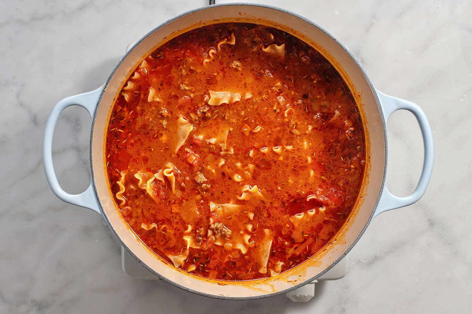 Lasagna noodles added to the dutch oven