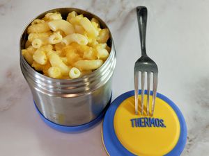 Thermos Foogo Stainless Steel Food Jar displayed on a marbled surface uncapped with mac n cheese inside of it