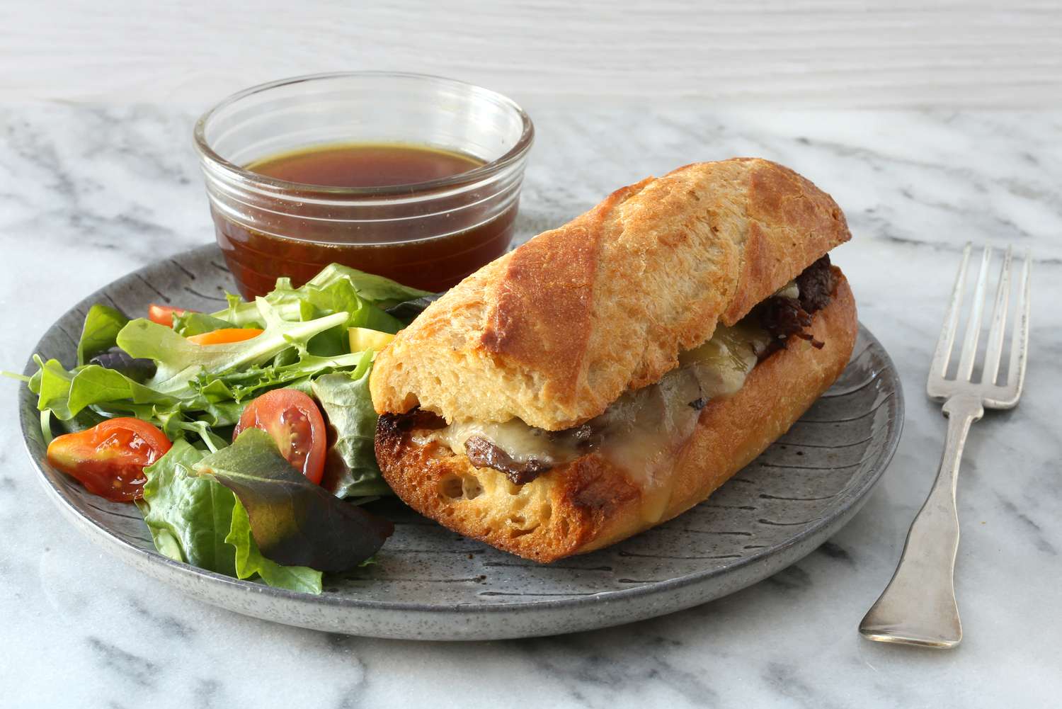 Instant Pot French dip sandwiches with jus.