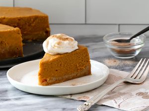 slice of pumpkin pie from the instant pot with whipped cream