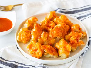 Oven-roasted cauliflower bites on a plate
