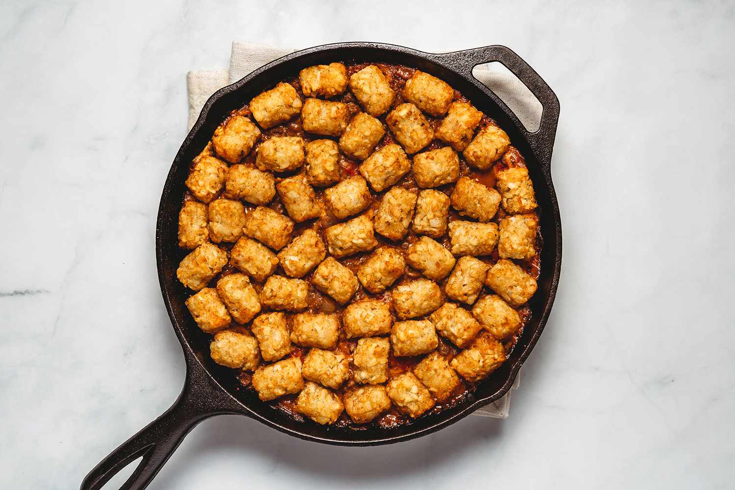 Cheeseburger Casserole in a cast iron pan 