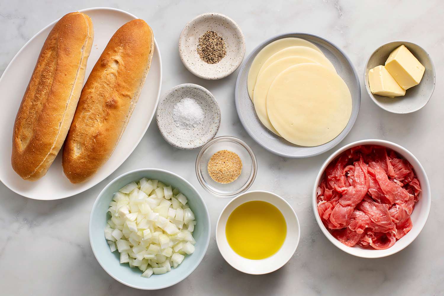 Ingredients to make Philly cheesesteaks