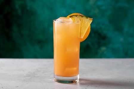 Cinderella mocktail drink with sliced orange garnish