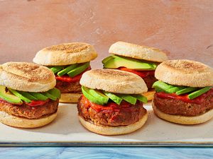 slow cooker burgers on a board