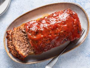 Easy classic meatloaf recipe sliced on a plate