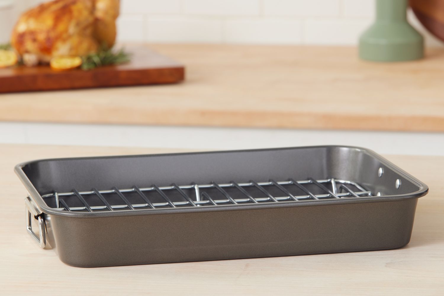 Farberware Nonstick Steel Roaster on a wood counter