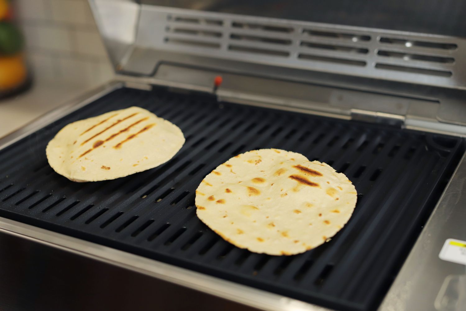 Grilling tortillas on the Kenyon city grill