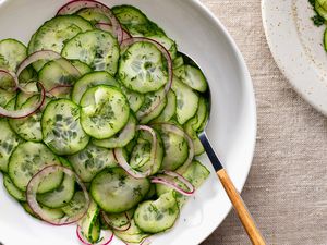 German Cucumber-Dill Salad (Gurkensalat) in a white bowl