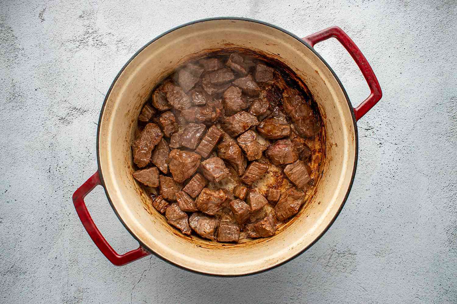 Beef chuck cooking in a pot 