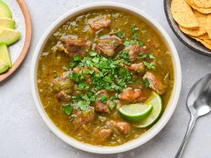 New Mexico Style Pork Green Chili in a bowl with a spoon