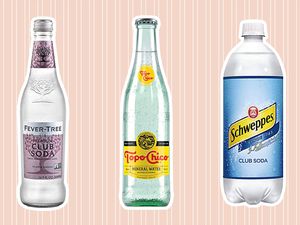 Assortment of club sodas outlined in white and displayed on a pink and white striped background 
