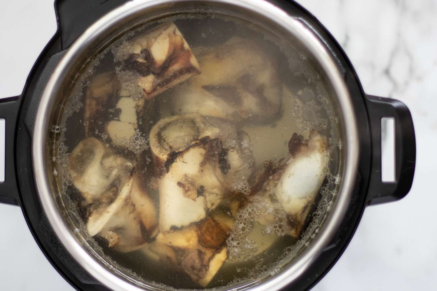 the roasted bones are boiled in the instant pot