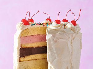 Ice cream cake with cherries on top