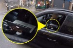 The woman was caught on the cyclists helmet cam using her laptop in traffic