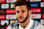 Adam Lallana of England speaks to the media