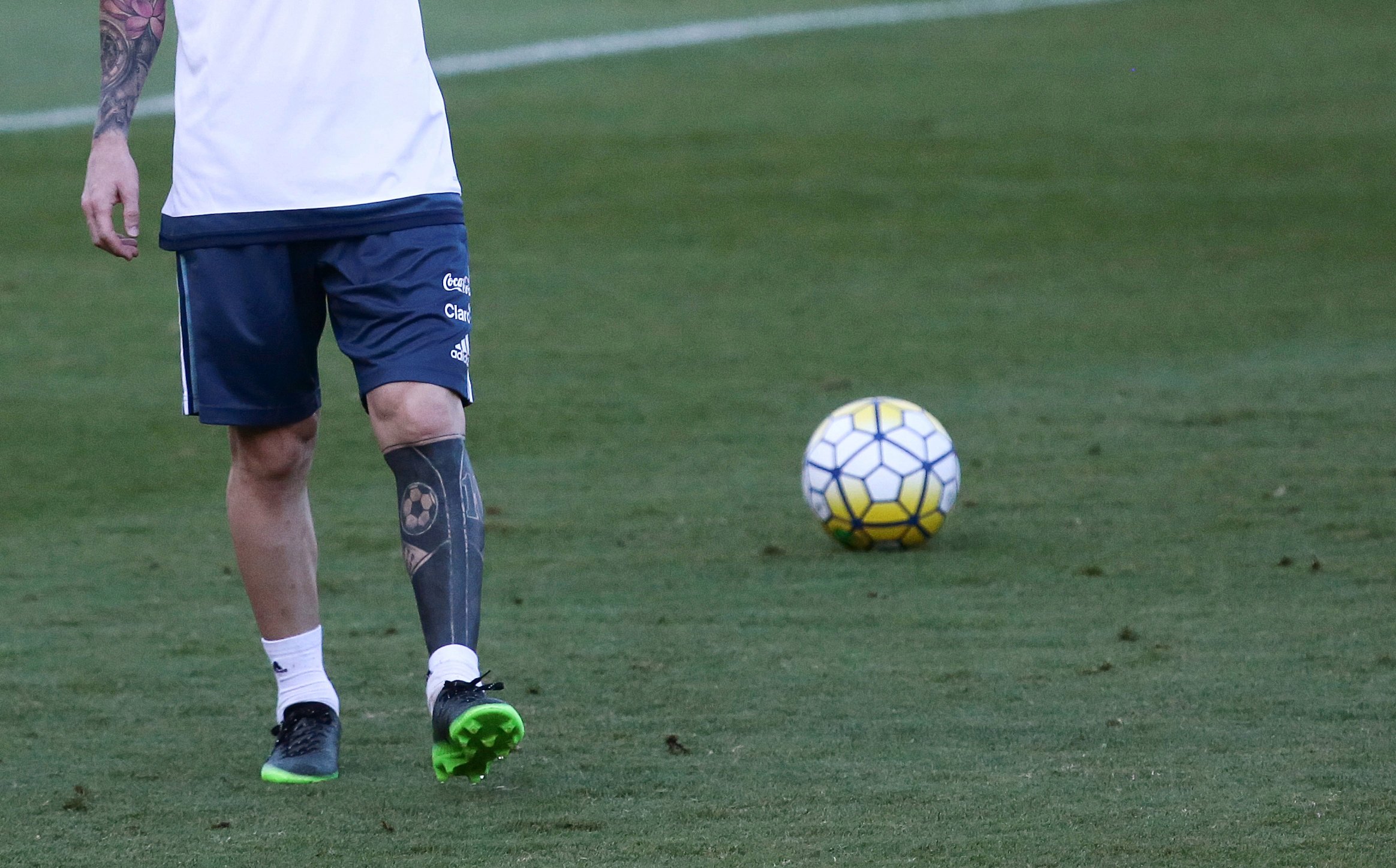  Messi is heavily covered in ink and has an all-black design covering most of his favoured left leg