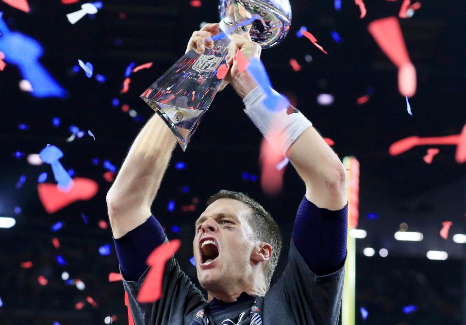  Tom Brady celebrates with the Vince Lombardi Trophy in the 2017 Super Bowl