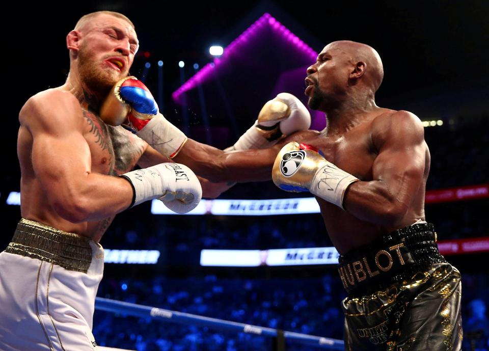  Floyd Mayweather, right, retired after defeating Conor McGregor, left, for his 50th win in August