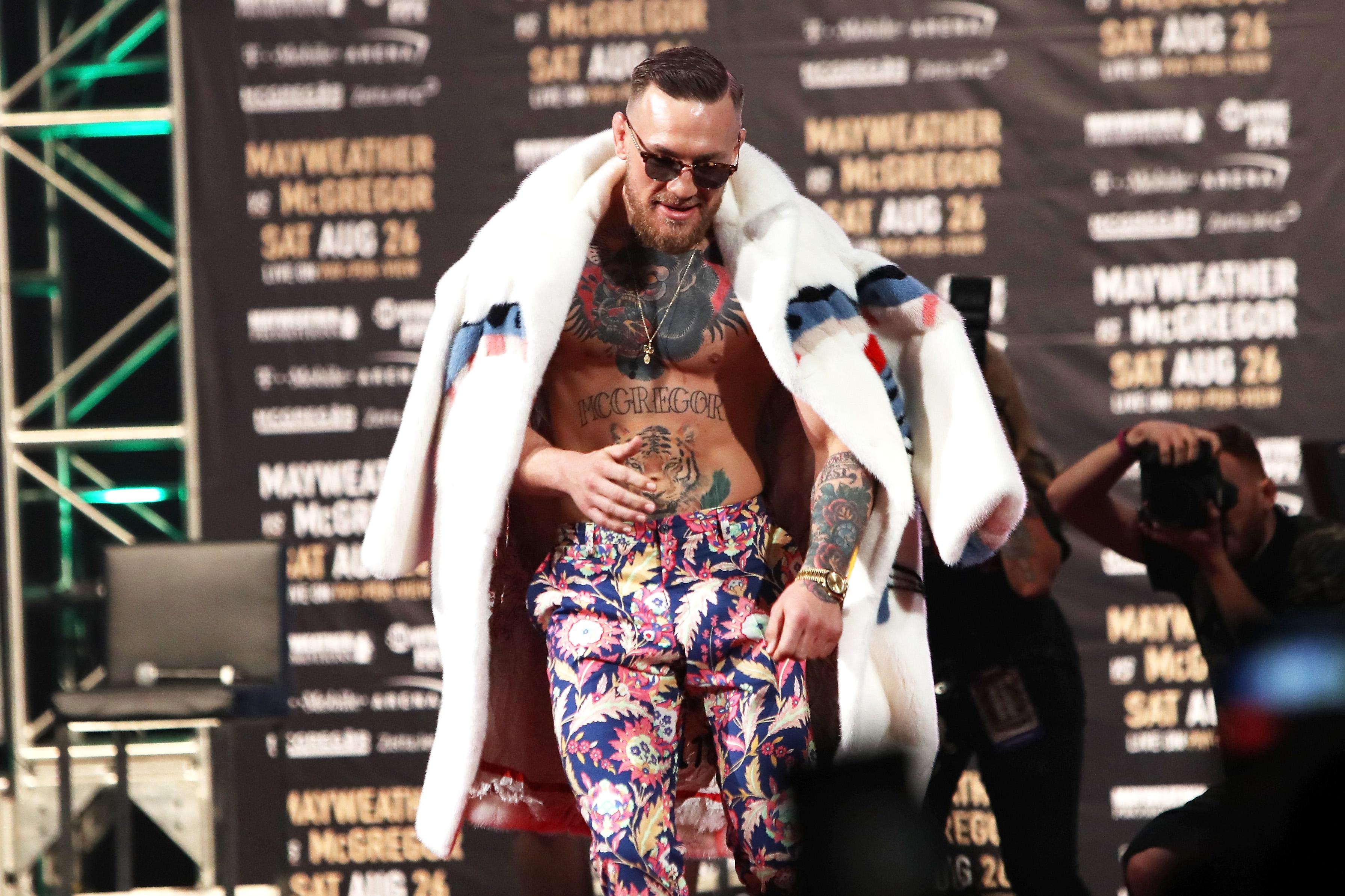  At a press conference, McGregor pimped up his look with a Day-Date 40 Gold