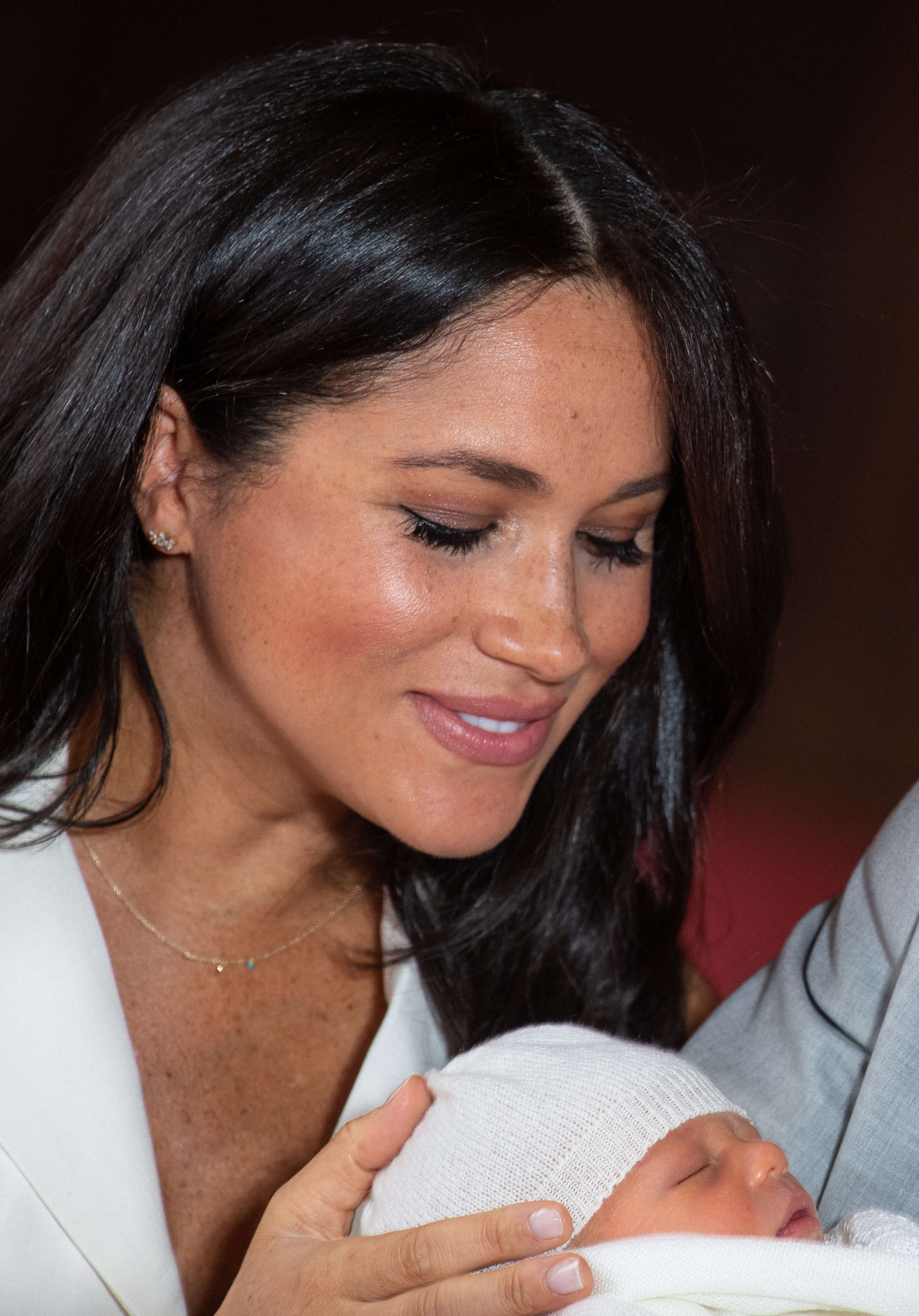  Mum Meghan coos over a newborn Archie Harrison Mountbatten-Windsor