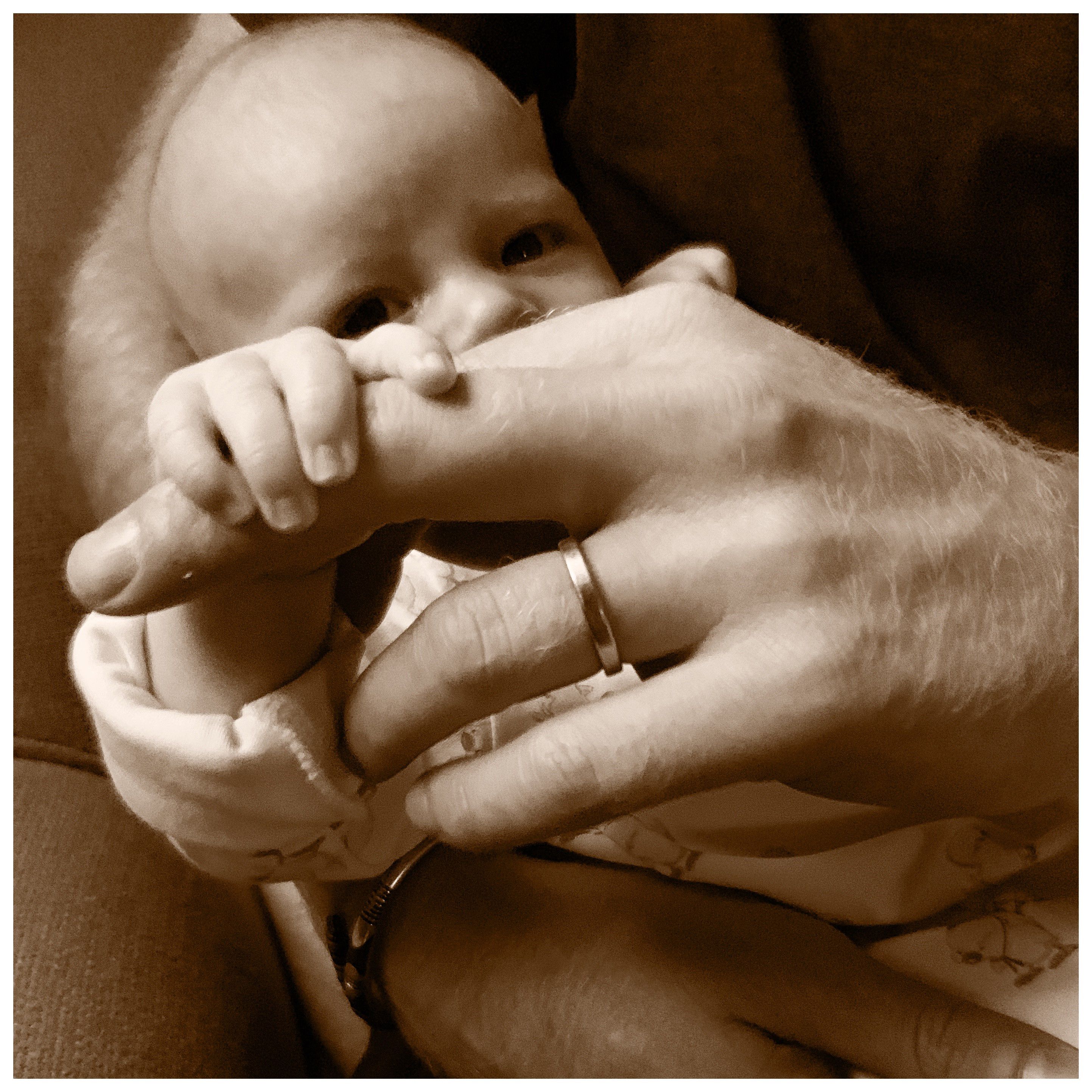  Prince Harry shared this sweet image cradling baby Archie on Father's Day